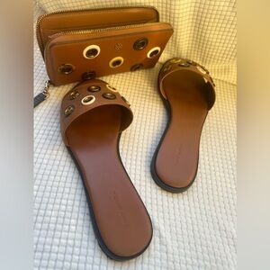 Size 11 slides and wristlet. Gently used.